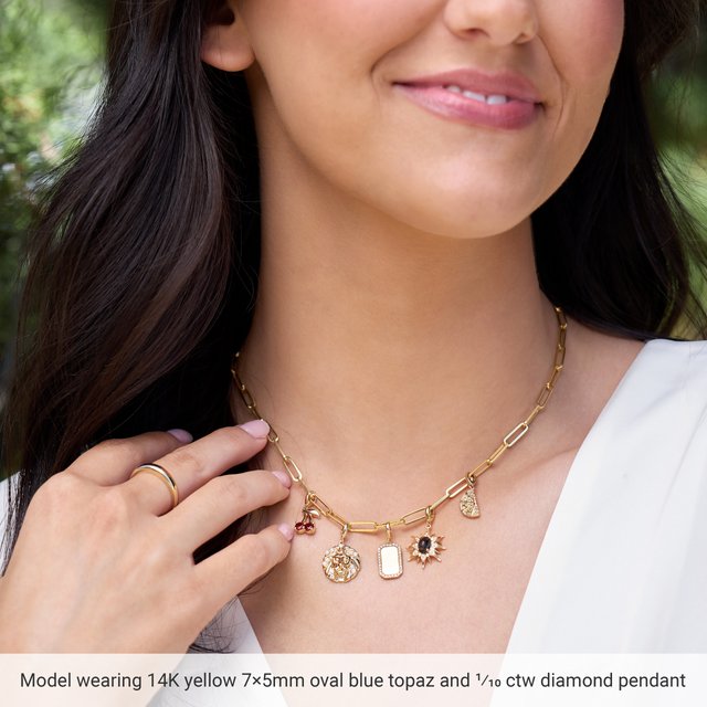 
                  
                    14K Yellow Natural London Blue Topaz & 1/10 CTW Natural Diamond Sun Charm/Pendant
                  
                